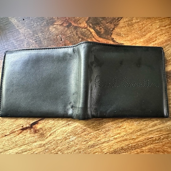 PAUL SMITH men’s black leather wallet.